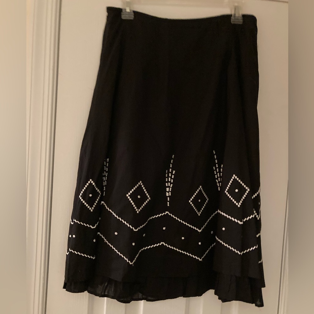 Black size 8 skirt with white embroidered trim